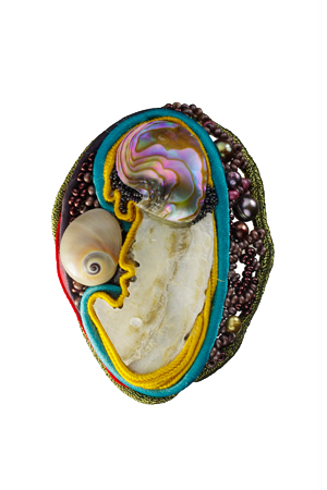 brooch: fabrics, abelone shell, snail shells, fresh water pearls, glass beads
