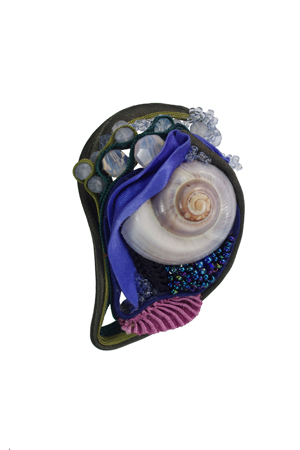 brooch: fabrics, baryta, snail shells, copper, glass beads